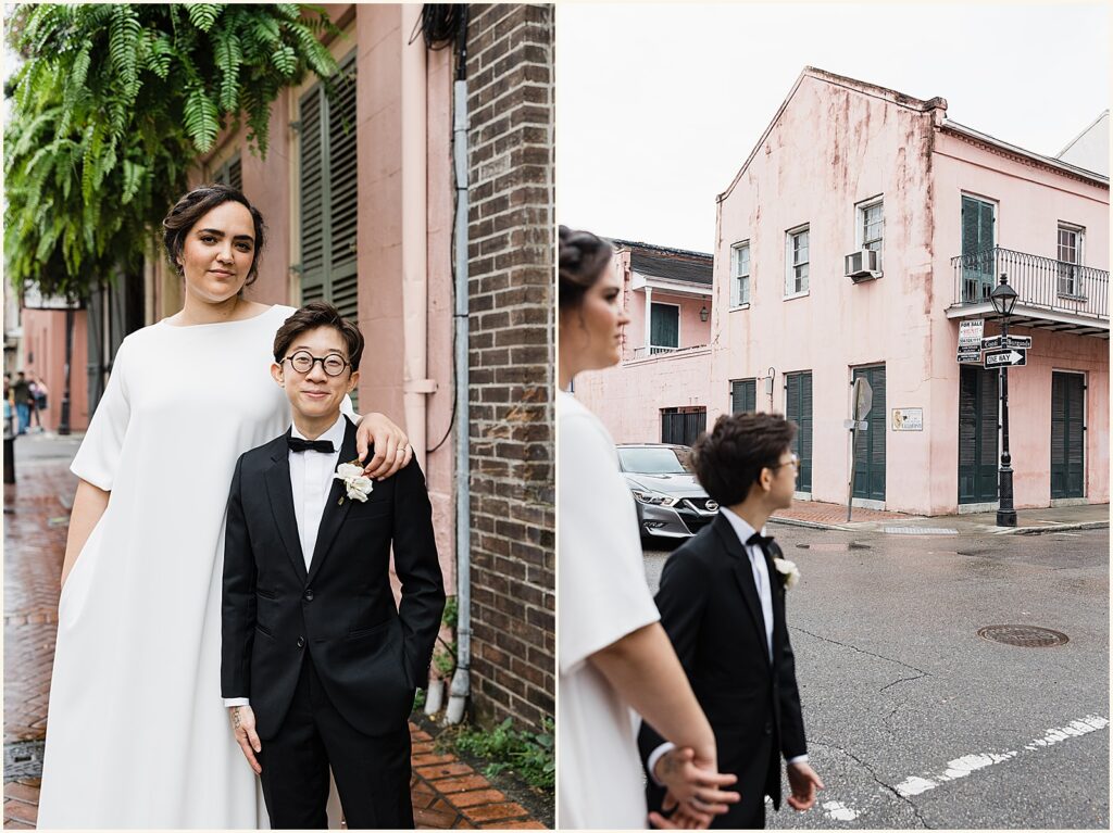 Two marriers pose in front of a pink house in the French Quarter.