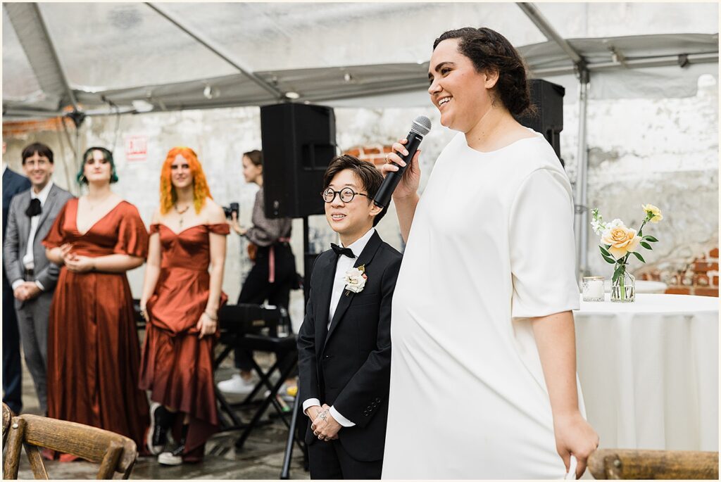 A bride gives a speech.