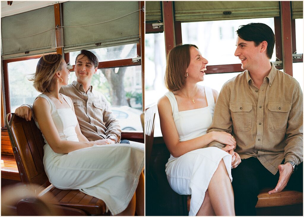 A man and woman sit in a New Orleans street car during a Garden District engagement session.